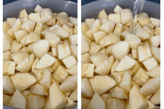 Apple chunks in a saucepan with water, cooking over medium-high heat to make homemade applesauce."