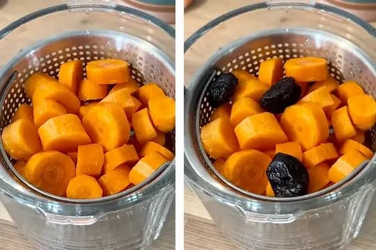 Bowl of freshly washed, peeled, and chopped carrots cut into chunks, ready for cooking.
