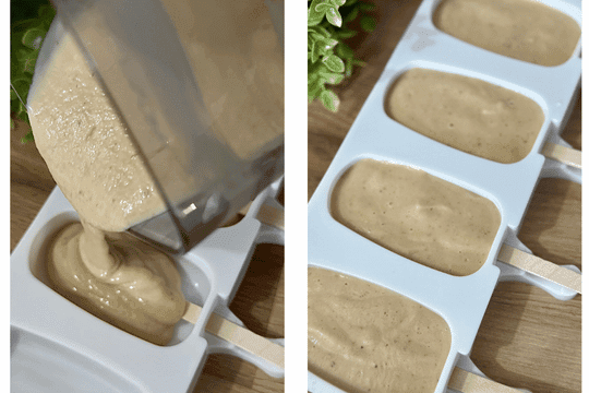 The banana mixture being carefully poured from a blender into popsicle molds, with both baby-friendly and standard molds visible.