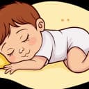 Cartoon illustration of a peaceful sleeping baby with brown hair, wearing a white onesie, resting on a yellow surface or blanket.
