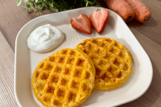 Cooling and serving cheesy carrot waffles cut into baby-friendly pieces for Baby