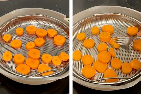 "Sliced carrots being steamed in a metal steamer basket, showing raw and cooked stages for softening vegetables for baby food or purees."