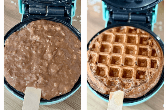 Waffle batter poured into a mini waffle maker with a popsicle stick placed in the center, ready to be cooked into waffle pops.