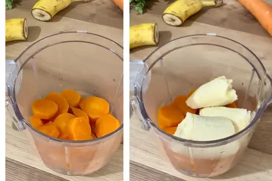 Cooked carrot slices and chunks of ripe banana in a blender, showing ingredients combined for a fruit and vegetable puree or baby food."