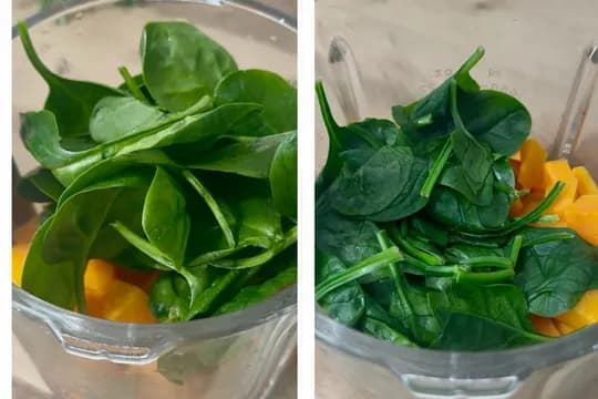 "Fresh spinach leaves layered over cubed butternut squash in a blender, ready to blend into a healthy vegetable puree or baby food recipe."