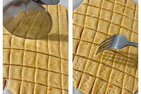 Cutting rolled banana dough into fun shapes for homemade toddler crackers using cookie cutters