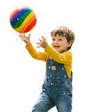 Toddler smiling while throwing and kicking a colorful ball, showing improved coordination and playful curiosity.
