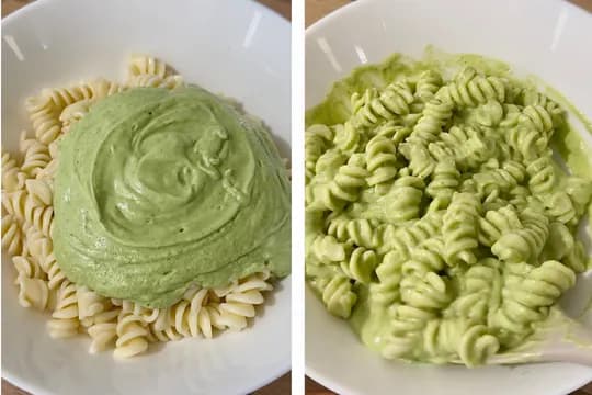 Pouring creamy broccoli avocado sauce over cooked pasta and gently stirring to coat evenly—creating a delicious, healthy family meal.