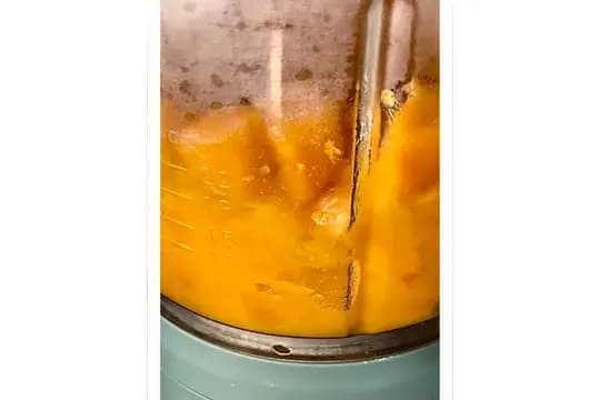 Blended sweet potato puree with a smooth texture, ready to serve.