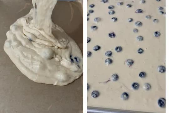 Evenly spreading pancake batter in a prepared baking sheet and baking until golden and set—simple blueberry sheet-pan pancake for a family-friendly breakfast.