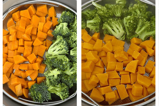 "Steamed sweet potato cubes and broccoli florets in a steamer basket — softened vegetables prepared for mashing in fritter recipe."