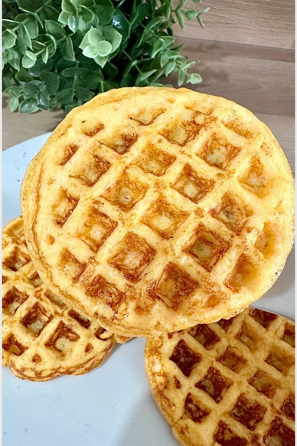 Golden, crispy cheesy sweet potato waffles, a perfect blend of sweet and savory flavors for breakfast or a healthy snack.
