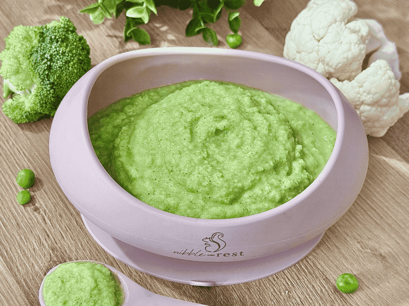 Smooth and colorful vegetable baby purée served in a small bowl, perfect for introducing healthy veggies to babies.