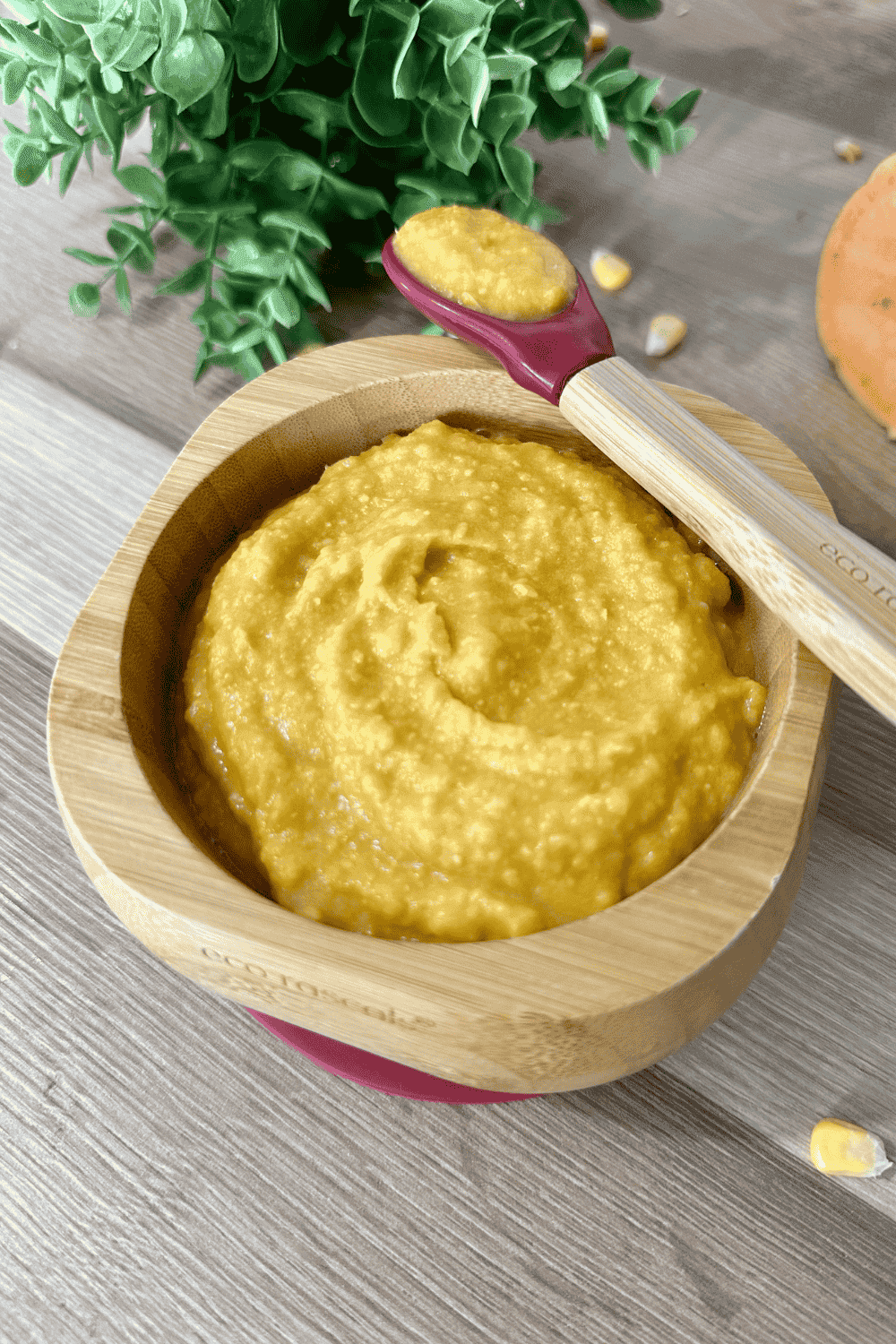 A smooth and creamy sweet potato corn puree served in a bowl, made with fresh sweet potatoes and corn for a naturally sweet and healthy baby food option.